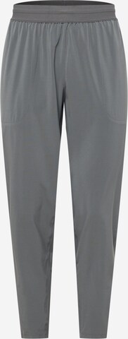 Effilé Pantalon de sport NIKE en gris : devant