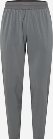 NIKE Tapered Sports trousers in Grey: front