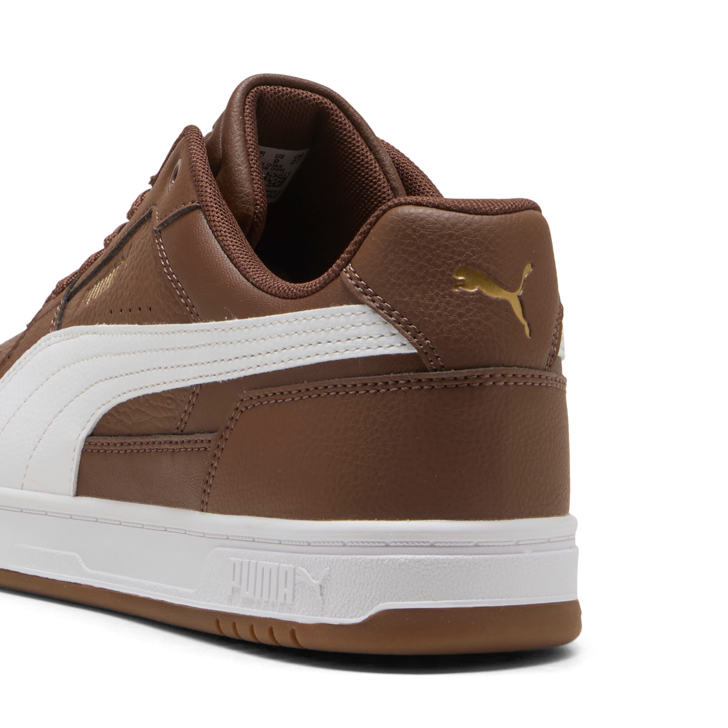 PUMA Sneaker 'Caven III' in Braun