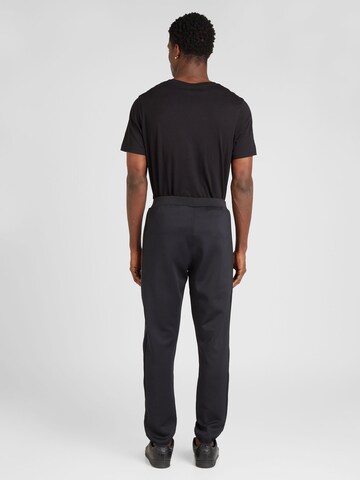 ELLESSE - Chándal 'Bunero' en negro