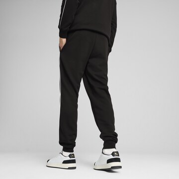 PUMA Tapered Sportbroek in Zwart