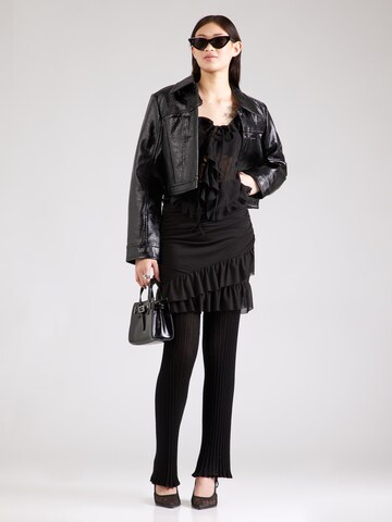 Monki - Blusa en negro