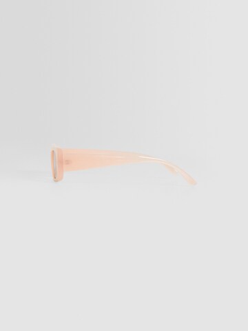 Lunettes de soleil Bershka en rose