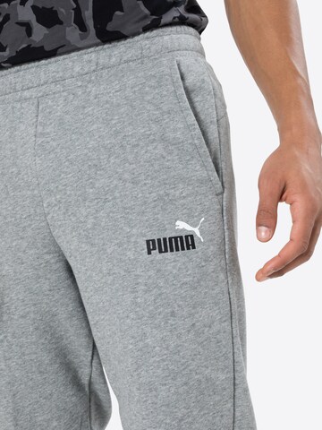 PUMA Ozke Športne hlače | siva barva