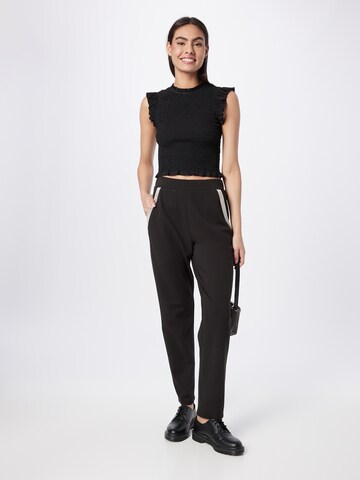 ABOUT YOU Tapered Broek 'Simone' in Zwart