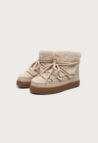 Après-ski 'CURLY' INUIKII en beige