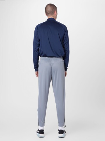 Regular Pantalon de sport 'Totality' NIKE en gris