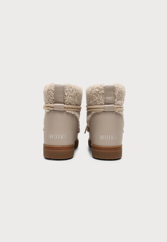 Après-ski 'CURLY' INUIKII en beige