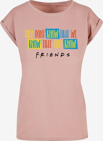 ABSOLUTE CULT T-Shirt 'Friends - They Don't Know' in Pink: predná strana