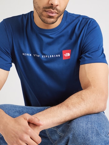 Maglietta 'NEVER STOP EXPLORING' di THE NORTH FACE in blu