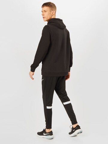 NIKE Slimfit Sporthose in Schwarz