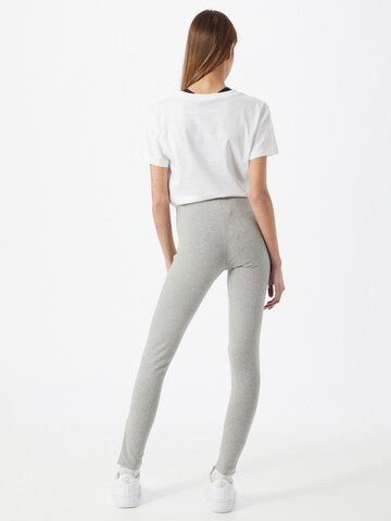 Skinny Pantalon de sport Champion Authentic Athletic Apparel en gris