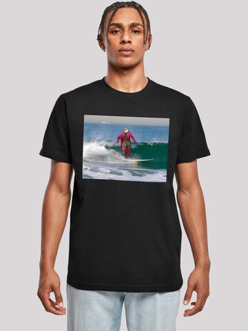 T-Shirt 'Batman TV Series Joker Surfing' F4NT4STIC en noir : devant