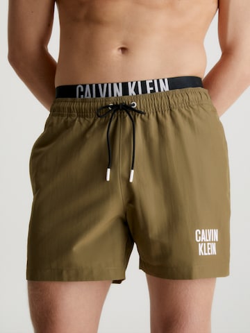 Calvin Klein Swimwear Board Shorts in Green: front