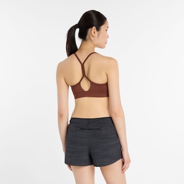 new balance Bralette Sports bra 'Essential' in Brown