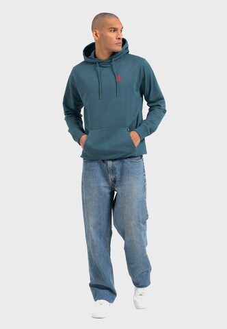 Oldskull Sweater 'Asian Neon Djane' in Blue