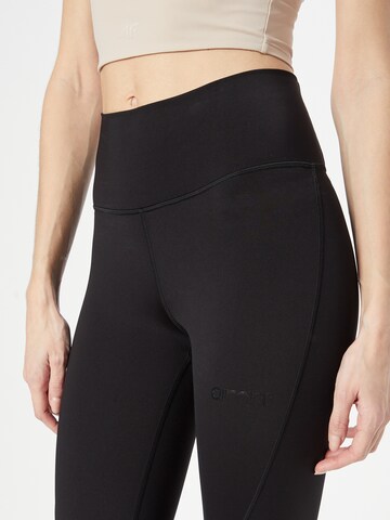 Skinny Pantaloni sportivi di aim'n in nero