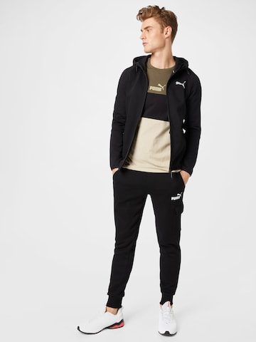 PUMA - Tapered Pantalón en negro