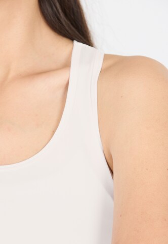 Athlecia Sports top 'Niya' in White