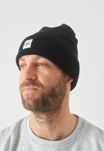 Cleptomanicx Beanie in Black: front