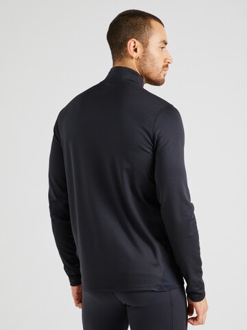 UNDER ARMOUR Funkční tričko 'Vanish' – černá