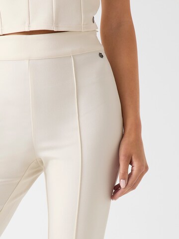 GUESS Flared Trousers 'Evelina' in Beige