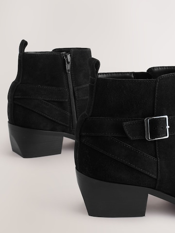 Next - Botim em preto