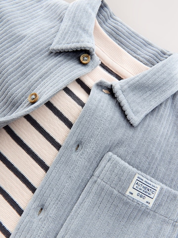 Set Next en bleu