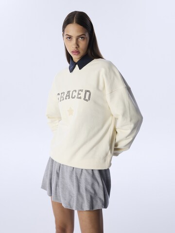 Sweat-shirt Twist en beige : devant