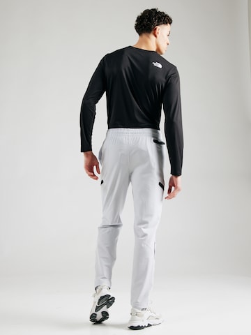 UNDER ARMOUR Tapered Sportbroek 'Unstoppable' in Grijs