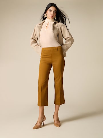 Tapered Pantaloni di oltre in marrone