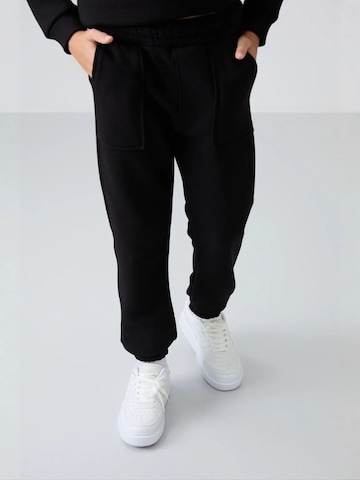 Tommy Life Trainingspak 'TOMMY Kinder Active Set' in Zwart