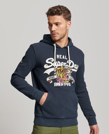 Sweat-shirt Superdry en bleu : devant