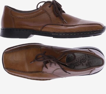 Rieker Flats & Loafers in 40 in Brown: front