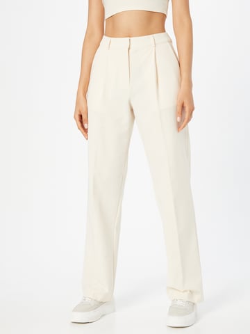 LENI KLUM x ABOUT YOU Loose fit Trousers with creases 'Eva' in Beige: front