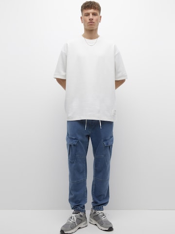 Pull&Bear Tapered Cargo jeans in Blue: front