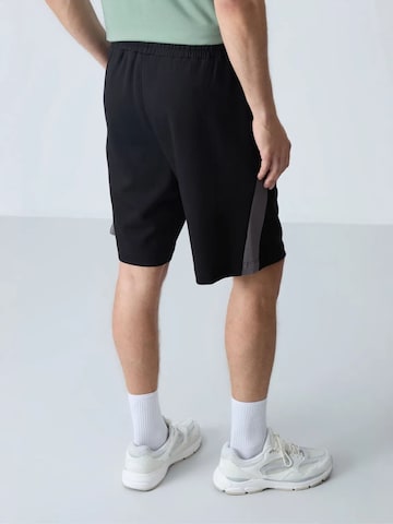 Regular Pantalon Tommy Life en noir