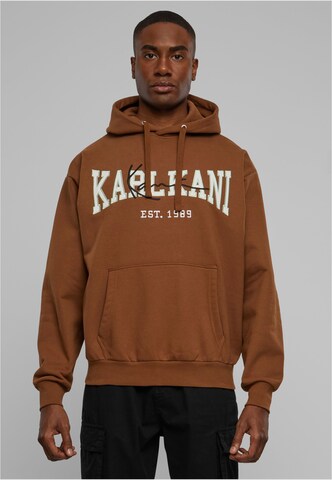 Veste de survêtement Karl Kani en marron : devant