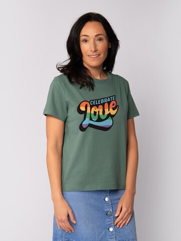 Maglietta 'Celebrate Love' di Watapparel in verde: frontale