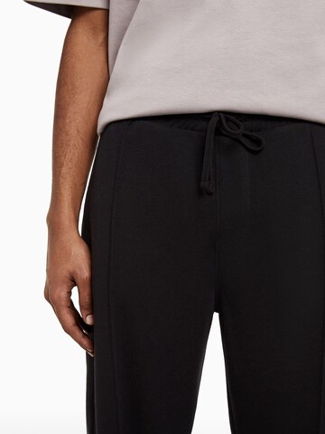 Bershka Loose fit Trousers with creases in Black