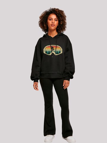 Sweat-shirt 'Retro Skibrille Wintersport' F4NT4STIC en noir