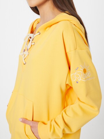 Femi Stories - Sweatshirt 'FELICIA' em amarelo