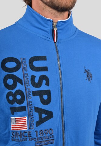 Veste de survêtement U.S. POLO ASSN. en bleu