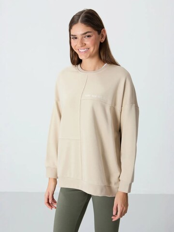 Tommy Life - Sweatshirt em bege