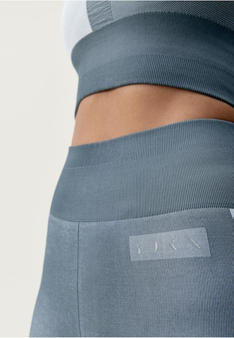 Born Living Yoga Skinny Sporthose 'Athena' in Blau