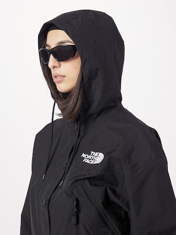 THE NORTH FACE Välikausitakki 'REIGN ON' värissä musta