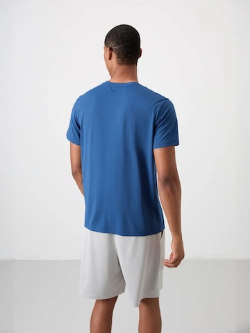 T-Shirt fonctionnel Tommy Life en bleu