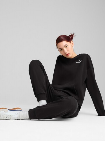PUMA Trainingspak in Zwart: voorkant