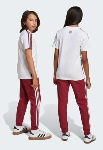 Effilé Pantalon de sport 'FC Arsenal Terrace Icons' ADIDAS ORIGINALS en rouge