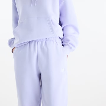 new balance - Tapered Calças 'Sport Essentials Fleece Jogger' em roxo